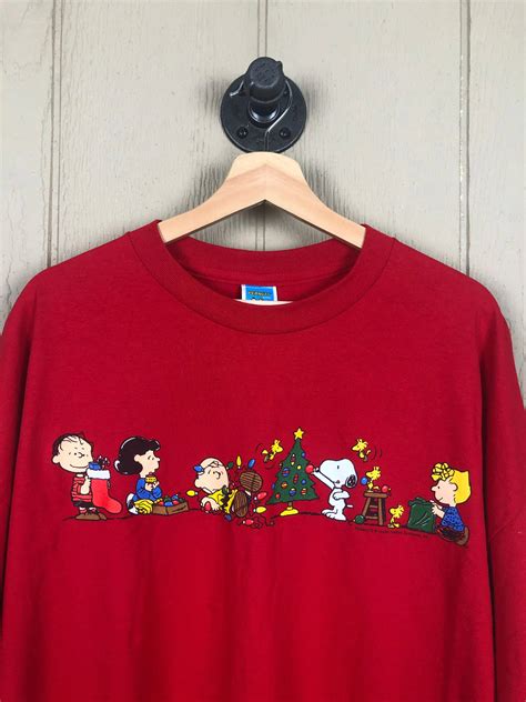 Charlie brown christmas t shirt - Check out our charlie brown christmas mens shirt selection for the very best in unique or custom, handmade pieces from our t-shirts shops.